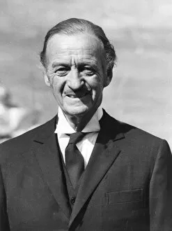 David Niven dressed as butler while filming Candleshoe in England - September 1976