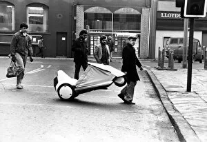 Images Dated 19th January 1985: David out and about on his Sinclair C5 in Cardiff. Crossing the road is no problem