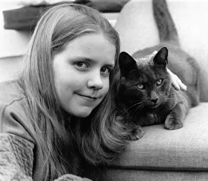 Dawn Herbdige and her cat. She says: 'Hes a little devil'