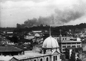 Last days of Singapore. A picture showing smoke rising over Singapore during a Japanese Last days of Singapore. A picture showing smoke rising over Singapore during a Japanese