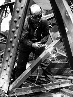 Demolition man Jack Spence gust through a steel girdon on 7th June 1962 Demolition man Jack Spence gust through a steel girdon on 7th June 1962