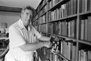 Denis Healey at his home in Sussex with one of his contributions to his library Denis Healey at his home in Sussex with one of his contributions to his library