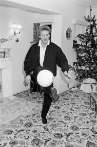 Denis Law, at home over Christmas in 1987. Denis Law CBE Denis Law, at home over Christmas in 1987. Denis Law CBE