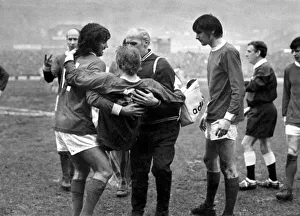 Denis Law of Manchester United being carried off the pitch after an injury Denis Law of Manchester United being carried off the pitch after an injury