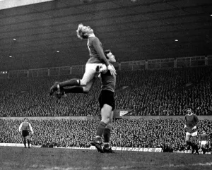 Core61 Gallery: Denis Law of Manchester United jumps up for the ball during the league match against