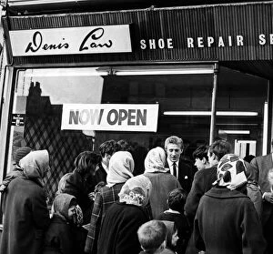 Supporters And Spectators Gallery: Denis Law of Manchester United opens his shoe repair shop in Moston lane, Blackley