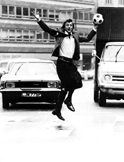 Denis Law wearing kilt in Regent Street London 1978 hours before leaving with