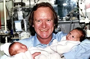Images Dated 23rd January 1990: Denis Waterman Actor with two babies that were born premature at Guy