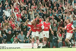 Images Dated 23rd September 1995: Dennis Bergkamp celebrates his first ever goal for his new club Arsenal