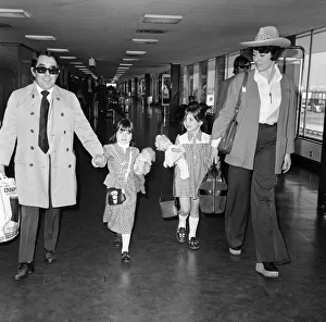 Images Dated 15th May 1973: The departure of Ronnie Corbett and his wife Anne with daughters Sophie, 5 and Emma