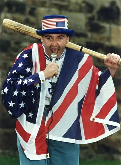 Images Dated 3rd August 1991: Derek Rae football commentator drapped in US flag August 1991