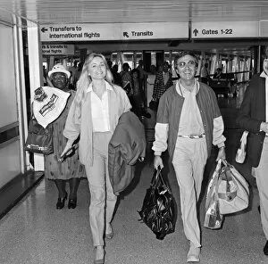 Images Dated 31st July 1984: Des O Connor arriving at Heathrow Airport from Australia with his girlfriend Jay