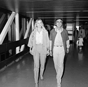 Images Dated 31st July 1984: Des O Connor arriving at Heathrow Airport from Australia with his girlfriend Jay