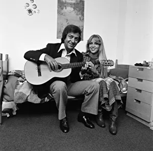 Images Dated 7th February 1978: Des O Connor playing guitar at home with his daughters. Tracy 7th February 1978
