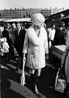 Diana Dors Actress walking throgh a busy market in Leeds Yorkshire Dbase MSI Diana Dors Actress walking throgh a busy market in Leeds Yorkshire Dbase MSI