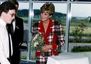 Diana, Princess of Wales wears a a Catherine Walker tartan coat dress