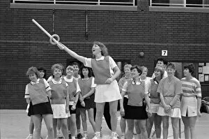 Diane Sykes, of Slaithwaite demonstrates the game of bench quoits to women who took part