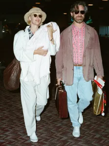 Briefcase Gallery: Director Steven Spielberg seen here at Heathrow Airport with Kate Capshaw with their new