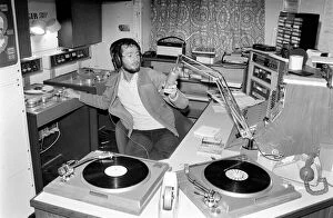 Disc. Jocky: Kenny Everett seen here in his home studio. February 1978