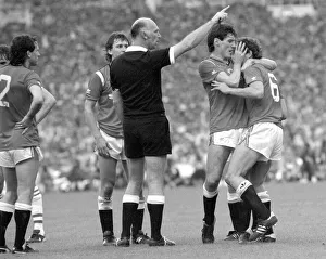 Distraught Manchester United footballer Kevin Moran is consoled by teammate Frank Distraught Manchester United footballer Kevin Moran is consoled by teammate Frank