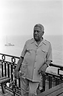 Images Dated 15th July 1989: Dizzy Gillespie seen here on the roof of the Leas Cliff Hall, Folkestone