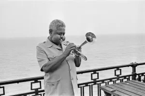 Images Dated 15th July 1989: Dizzy Gillespie seen here on the roof of the Leas Cliff Hall, Folkestone