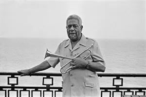 Images Dated 15th July 1989: Dizzy Gillespie seen here on the roof of the Leas Cliff Hall, Folkestone