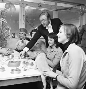 Dog Owners and their pets seen here having a Christmas party as actor Ronald Fraser acts Dog Owners and their pets seen here having a Christmas party as actor Ronald Fraser acts