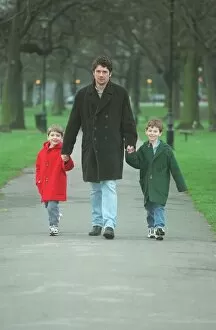 Images Dated 29th March 1998: Dominic Taylor actor with his sons Arthur 6 in red coat