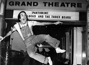 Images Dated 11th January 1977: Don Maclean, actor and comedian, jumps for joy outside the Grand Theatre in Birmingham