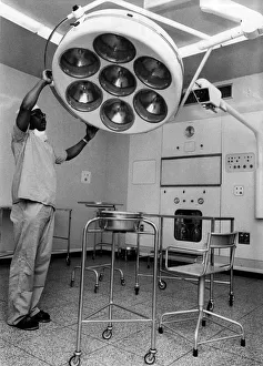 Donald Curtiss, Theatre Technician, prepares one of the two new operating theatres which Donald Curtiss, Theatre Technician, prepares one of the two new operating theatres which
