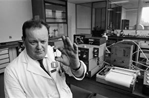 Dr. Frank Skuse studies a blood sample for alcoholic content at the North West Forensic Dr. Frank Skuse studies a blood sample for alcoholic content at the North West Forensic