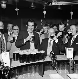 A drinkers dream - man with twenty pints in the pub. 1st January 1973 A drinkers dream - man with twenty pints in the pub. 1st January 1973