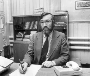 Drummond Middle School headmaster Ray Honeyford at his desk. 17th September 1985 Drummond Middle School headmaster Ray Honeyford at his desk. 17th September 1985