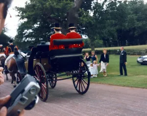 Duchess of York with her family as the Queen's carriage sweeps past Duchess of York with her family as the Queen's carriage sweeps past