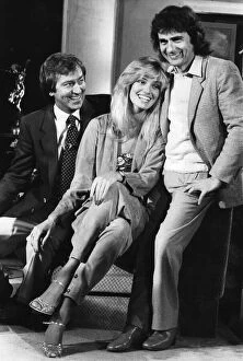 Dudley Moore and Susan Anton laughing during filming interview with Des O'