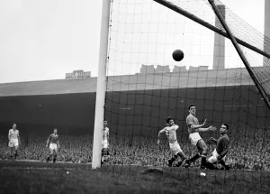 Core61 Gallery: Dugdale the Villa centre-half fails to clear with a header and scores Man utd'