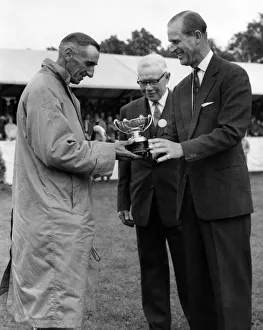 The Duke of Edinburgh presents Mr Tom Leedham of Lancashire with the Waddilove (Shepherds The Duke of Edinburgh presents Mr Tom Leedham of Lancashire with the Waddilove (Shepherds