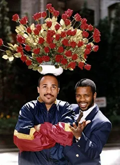 Images Dated 28th April 1992: Duke McKenzie Boxing WBO Bantamweight champion holds a flower pot full of red roses