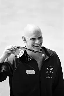 Images Dated 22nd July 1980: Duncan Goodhew swimmer takes part in medal ceremony after winning gold medal in Men'