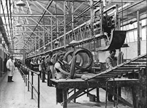 The Dunlop Factory in The West Midlands, England. Workers making tyres The Dunlop Factory in The West Midlands, England. Workers making tyres