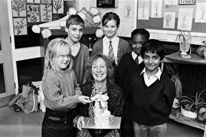 Dustbin delight, Mrs Margaret Sutcliffe, of Marsh, presents one of the dustbin-shaped