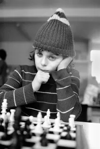 East End Kids Chess Congress: A West Ham supporter, complete with his West Ham hat makes East End Kids Chess Congress: A West Ham supporter, complete with his West Ham hat makes
