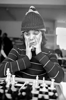 Images Dated 18th February 1975: East End Kids Chess Congress: A West Ham supporter, complete with his West Ham hat makes