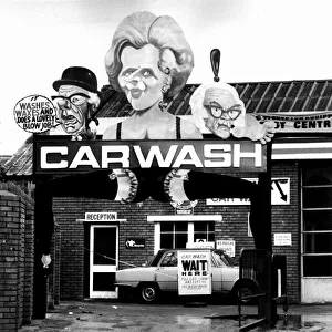 East London carwash sign showing Margaret Thatcher British Prime Minister 10th February East London carwash sign showing Margaret Thatcher British Prime Minister 10th February