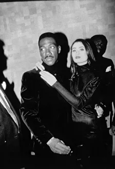 Eddie Murphy Actor/Comedian with actress Charlotte Lewis star of the Golden Child Eddie Murphy Actor/Comedian with actress Charlotte Lewis star of the Golden Child