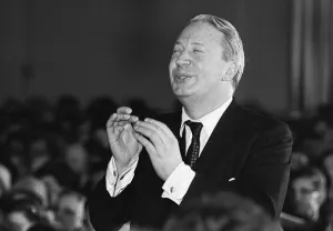 00876 Gallery: Edward Heath conducts Christmas carol singing at a Broadstairs, Kent