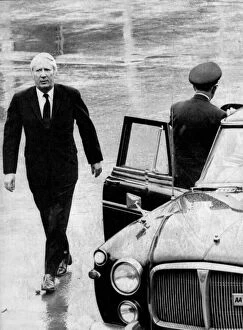 Images Dated 1st December 1972: Edward Heath walking in the rain to official car - December 1972