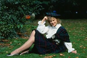 00192 Gallery: Elaine Smith actress sitting on grass wearing kilt and hat