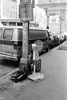 Images Dated 26th June 1984: Electric free standing fan, abandoned on street pavement, under sign, Domenico Bus Lines